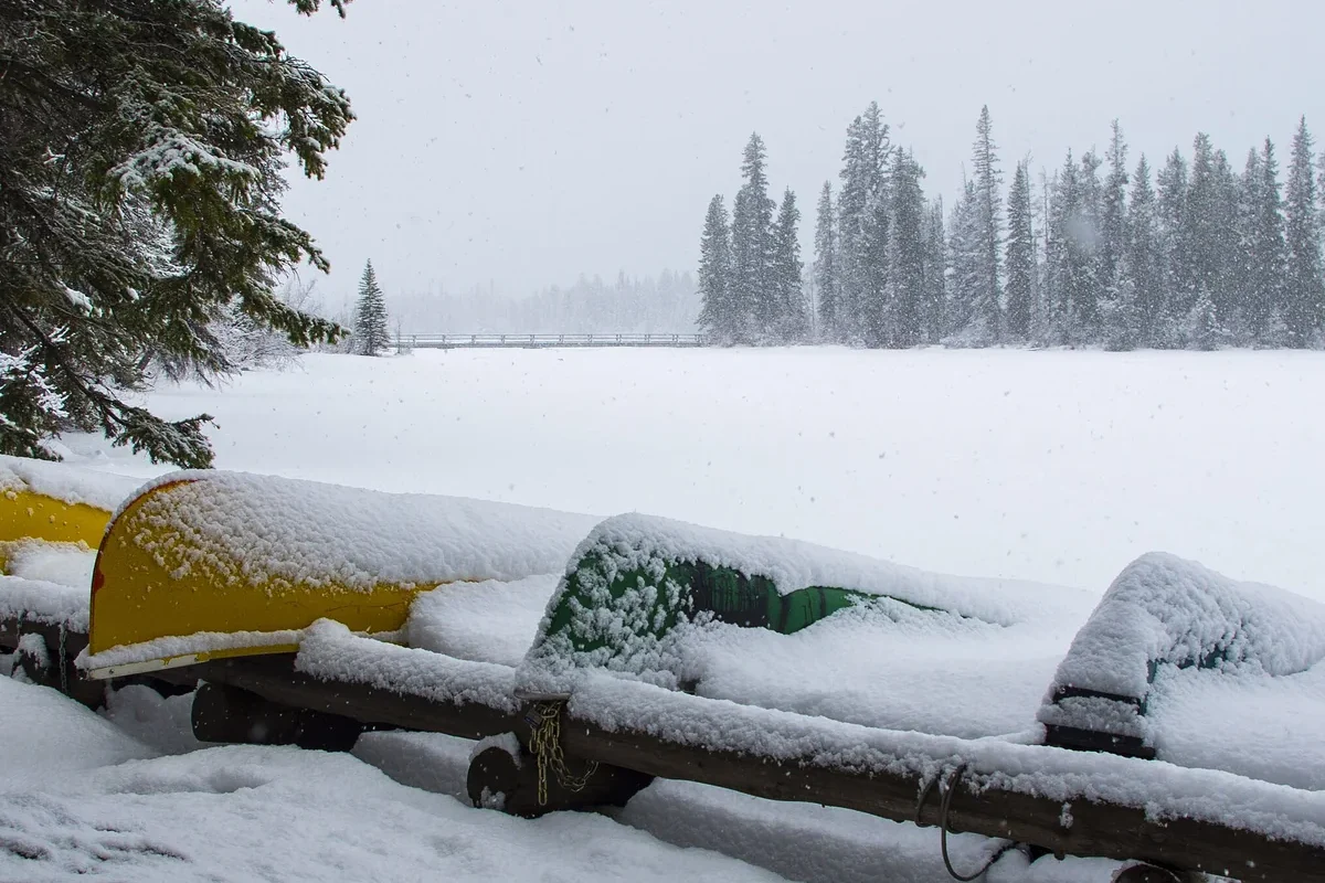 Canoes beside Pyramid Lake during winter