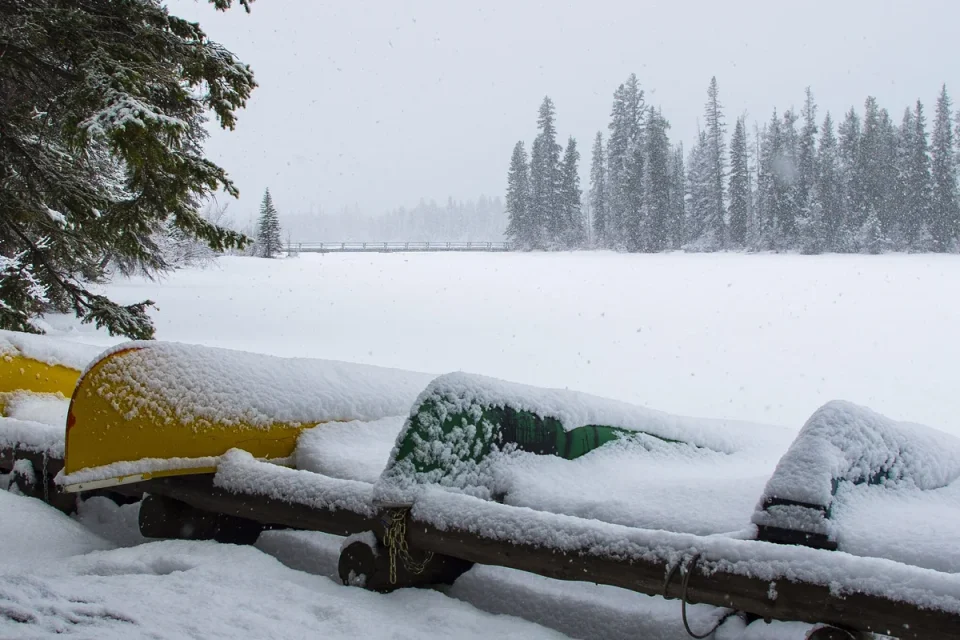 Canoes beside Pyramid Lake during winter